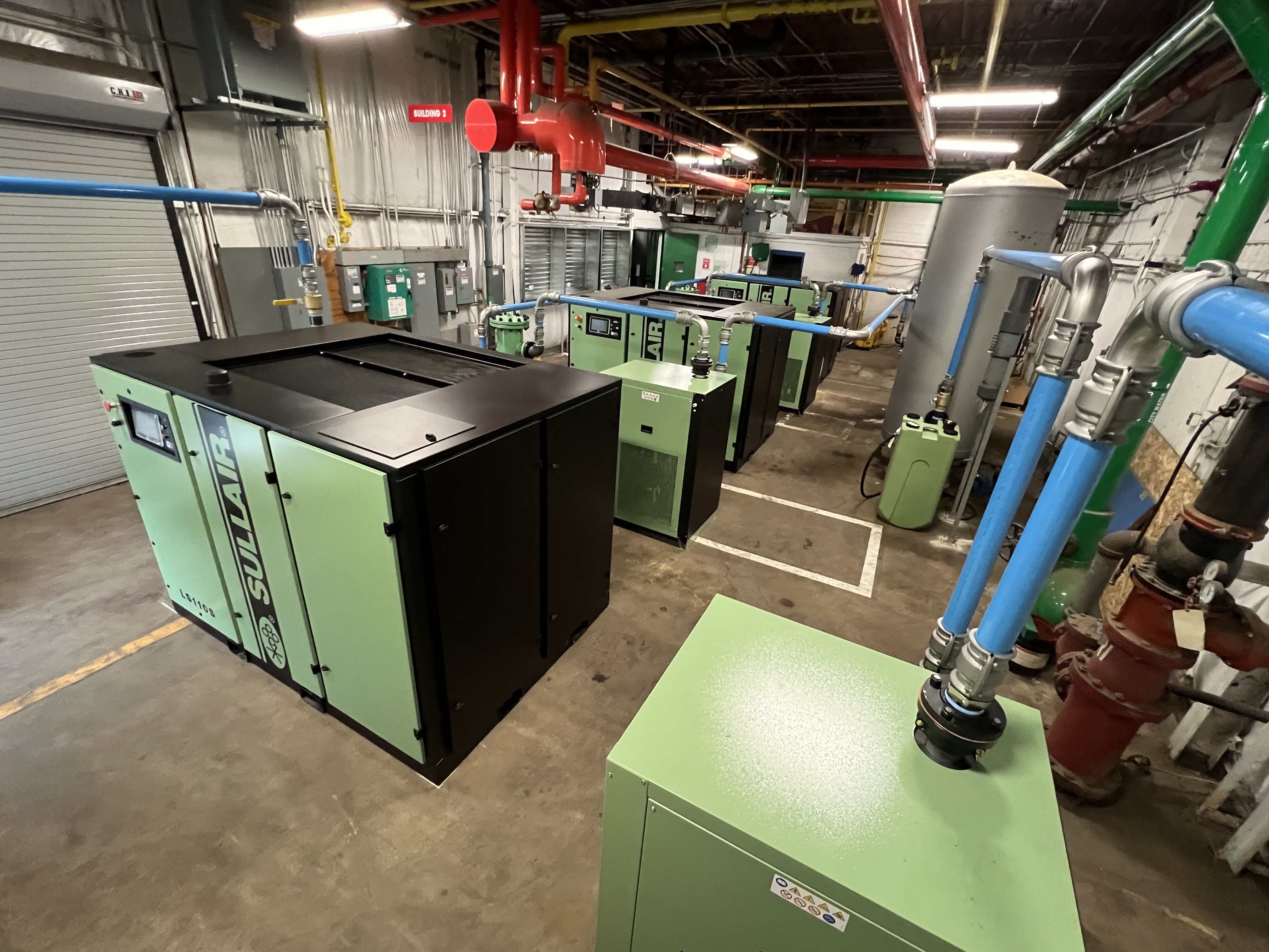 Air Compressor Room With Three Stationary Compressors